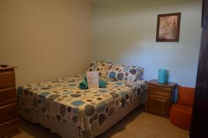 En eller flere senger på et rom på Guesthouse Casa Lapa