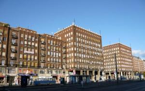 two tall buildings on a city street next to a street at Center of Budapest Apartment 3 in Budapest