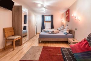 Ein Bett oder Betten in einem Zimmer der Unterkunft Wieseneck ii - Apartment in Fügen