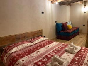 Postel nebo postele na pokoji v ubytování Rascard Monterosa