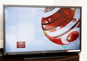TV a/nebo společenská místnost v ubytování APA Hotel Kamata Ekimae