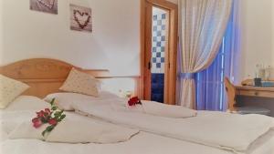 Postel nebo postele na pokoji v ubytování Bed & Breakfast SISSI