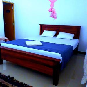 Postel nebo postele na pokoji v ubytování Margosa Guesthouse