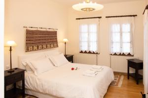 Ένα ή περισσότερα κρεβάτια σε δωμάτιο στο Θαλλώ Luxurious Villa