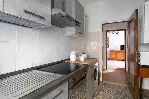 Kuchyň nebo kuchyňský kout v ubytování Casa di Chiara