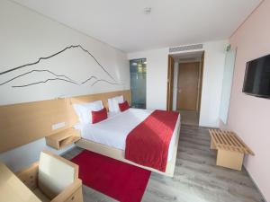 Postel nebo postele na pokoji v ubytování Hotel Happy Day