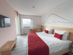 Postel nebo postele na pokoji v ubytování Hotel Happy Day