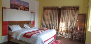 Vuode tai vuoteita majoituspaikassa London House Resort