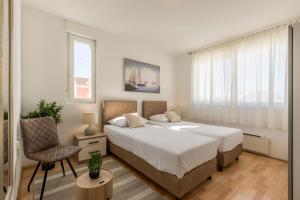 Postel nebo postele na pokoji v ubytování Split-Villas Dalmatica for 12
