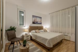 Postel nebo postele na pokoji v ubytování Split-Villas Dalmatica for 12