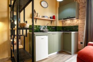 Küche/Küchenzeile in der Unterkunft Priorat Aparthotel