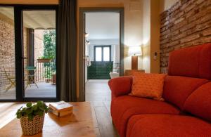 Ein Sitzbereich in der Unterkunft Priorat Aparthotel