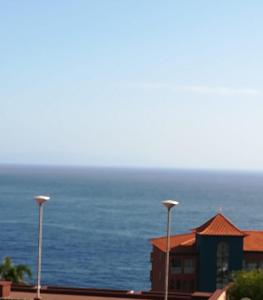 a building with a view of the ocean at Tamariz Flat in Santa Cruz