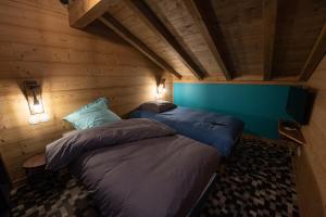 Vuode tai vuoteita majoituspaikassa TOUT NEUF - Chalet Paul avec sauna