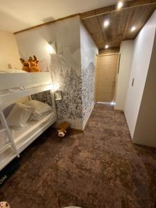 Postel nebo postele na pokoji v ubytování Avoriaz le M1212