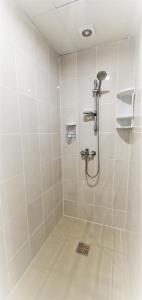 a bathroom with a shower with a shower at Хостел"Компас" in Kungur