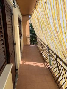 a hallway of a house with a striped wall at Apartment Ivanka in Senj