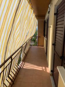 a hallway of a house with a striped wall at Apartment Ivanka in Senj