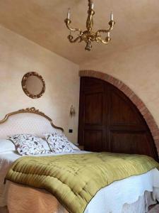 Giường trong phòng chung tại Villa Pianelli