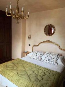 Postel nebo postele na pokoji v ubytování Villa Pianelli
