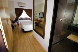 Postel nebo postele na pokoji v ubytování C'haya Hotel