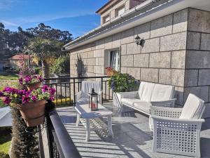 Posedenie v ubytovaní Hogar Gallán