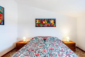 A bed or beds in a room at Splendida Villa con vista sull'Isola di Cirella