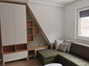 Predel za sedenje v nastanitvi Apartman Divcigora Sokic 2