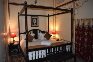 Giường trong phòng chung tại Hotel Nawal Sagar Palace - Bundi