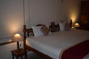 Postel nebo postele na pokoji v ubytování Hotel Nawal Sagar Palace - Bundi