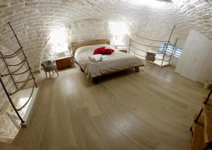 Postel nebo postele na pokoji v ubytování Le Vecchie Mura suite & room