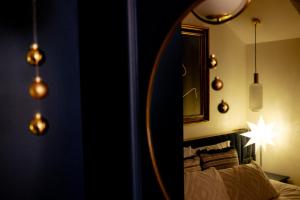 Łóżko lub łóżka w pokoju w obiekcie Apartamenty Stare Miasto Zamość, Prywatny Parking, Winda