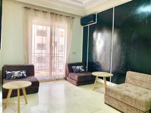 Zona d'estar a Sab 10 - Superb view of the Hassan 2 mosque. Comfortable apartment in a great location.