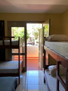 Ένα ή περισσότερα κρεβάτια σε δωμάτιο στο La Casa de Pedro Hostel