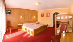 Postel nebo postele na pokoji v ubytování Hotel Restaurant Sidan