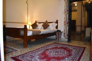 Postel nebo postele na pokoji v ubytování Hotel Nawal Sagar Palace - Bundi