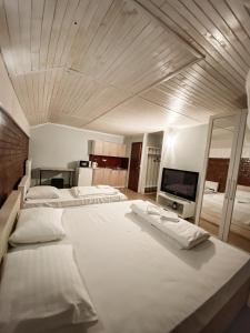 Posteľ alebo postele v izbe v ubytovaní Guest House Lviv