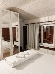 Posteľ alebo postele v izbe v ubytovaní Guest House Lviv
