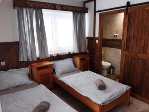 Postel nebo postele na pokoji v ubytování Na wierchu
