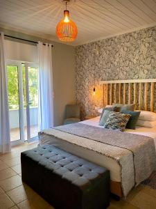 Postel nebo postele na pokoji v ubytování Villa Hylas Luxury Bed & Breakfast Kilada