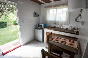 Una cocina o kitchenette en Posada Casa de Piedra