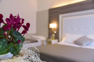 Postel nebo postele na pokoji v ubytování Hotel Crystal