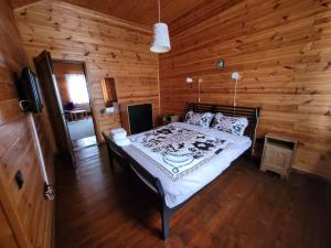 Ένα ή περισσότερα κρεβάτια σε δωμάτιο στο Casa Caluco