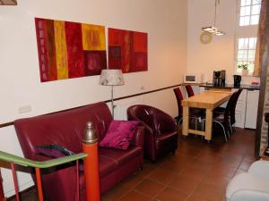 O zonă de relaxare la Welcoming Apartment near Town Center in Mesch