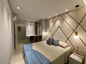 Katil atau katil-katil dalam bilik di Apartamento maravilhoso com piscina e vista mar Mirante Home Club +95 gambar