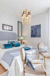 Ένα ή περισσότερα κρεβάτια σε δωμάτιο στο Appartmento fronte mare con garage privato