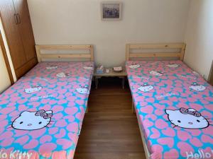Postel nebo postele na pokoji v ubytování ビーチハウス沼津Beach house numazu ビーチ至近