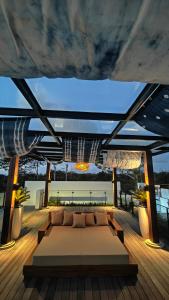 O zonă de relaxare la Eaze Villas Uluwatu +27 fotografii