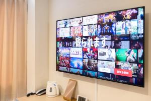 TV a/nebo společenská místnost v ubytování Beppu Daiiti Hotel