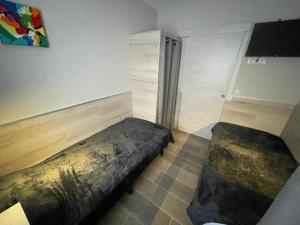 Letto o letti in una camera di Immodelpas Pessons